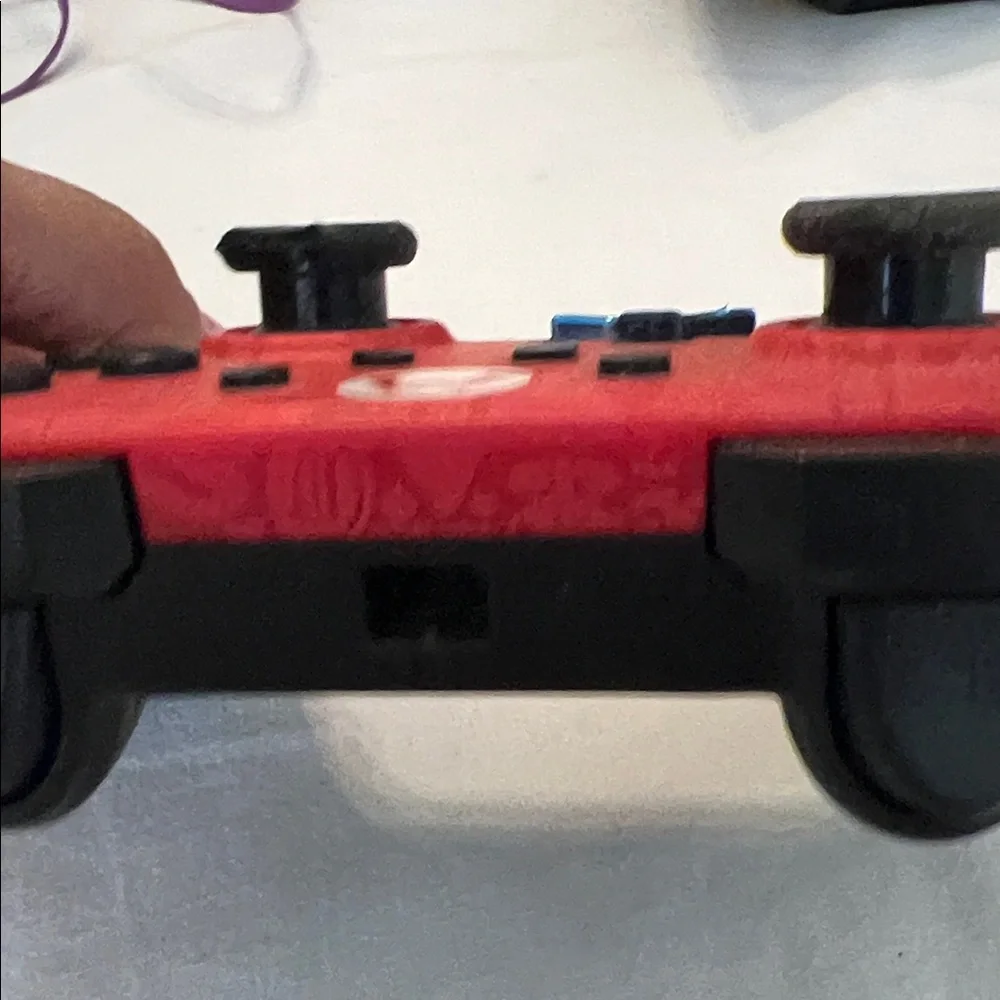 Nintendo Red and Blue Gaming Controllers